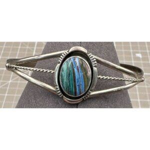 Vintage Sterling Silver Leonard Nez Navajo Cuff Bracelet Rainbow Calsilica Cente